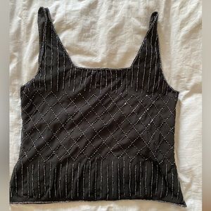 Black camisole for evening wear.